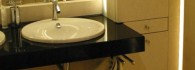 Bathroom Design. Luxury Bathroom made from Limestone & black Granite - Detail of the granite vanity top.jpg